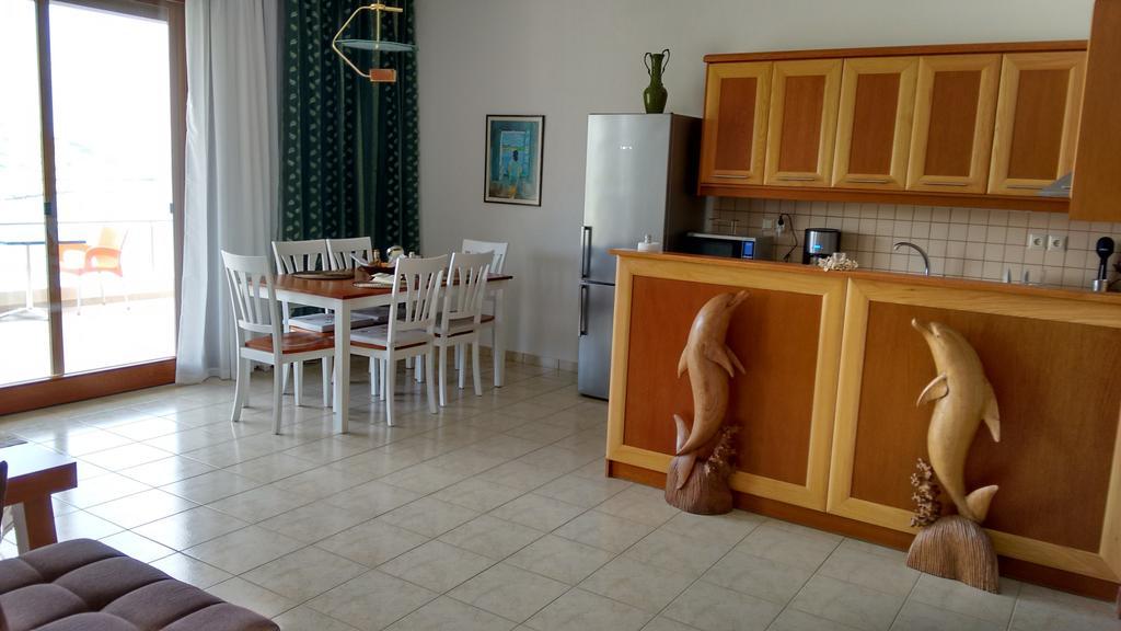 Tholos Bay Suites Kavúszi Szoba fotó
