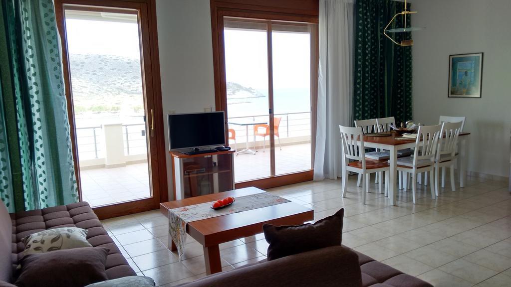 Tholos Bay Suites Kavúszi Szoba fotó