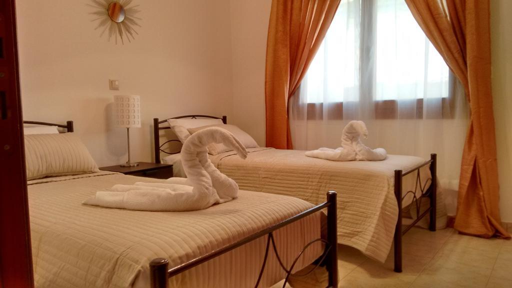 Tholos Bay Suites Kavúszi Szoba fotó